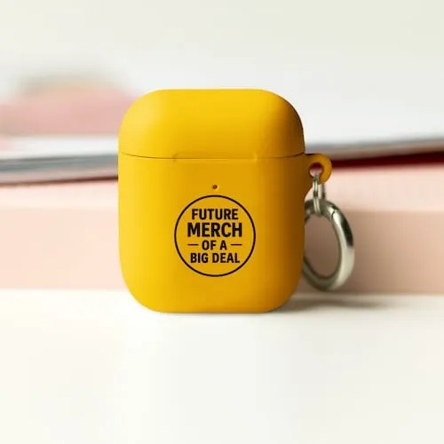 A yellow Airpods case with black text that says Future Merch of a Big Deal representing tech accessory promotional products available in our store for same-day online ordering in Chicago .